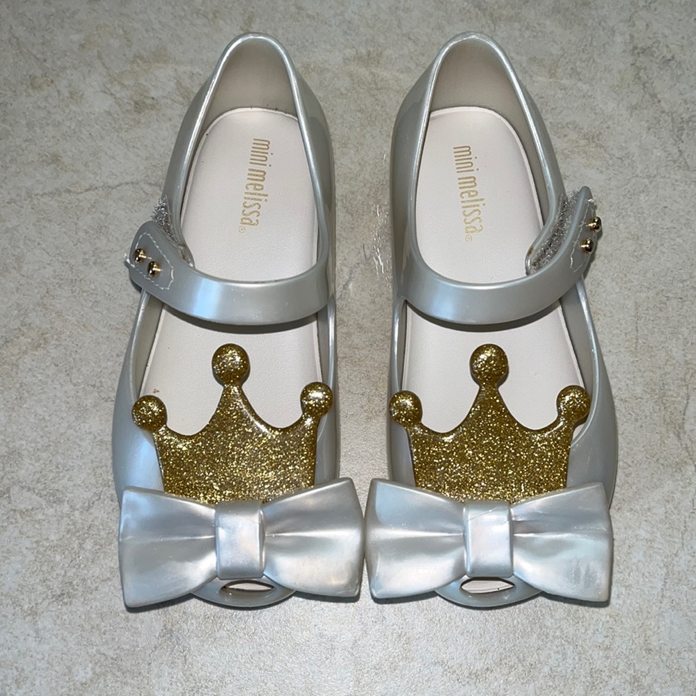 Mini Melissa toddler’s shoes.